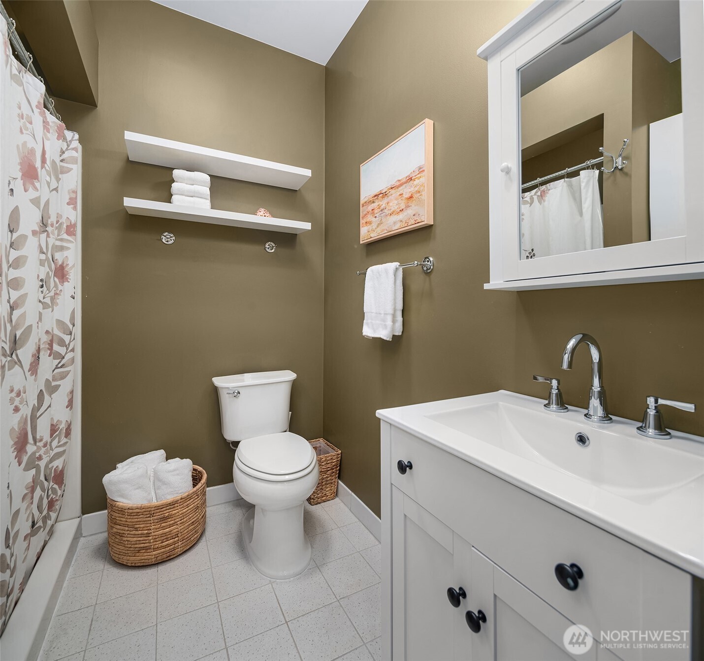 6007 Southwest 240th Street Vashon, WA 98070 - Photo 28 of 40 a bathroom with a sink mirror and toilet