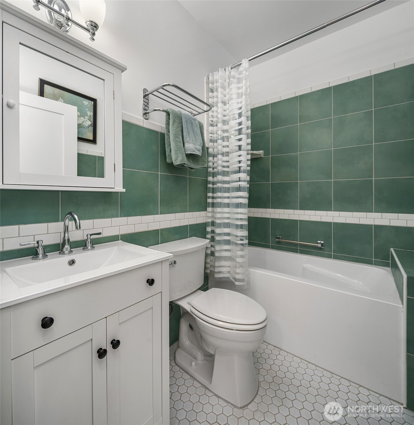 6007 Southwest 240th Street Vashon, WA 98070 - Photo 29 of 40 a bathroom with a sink a toilet and shower
