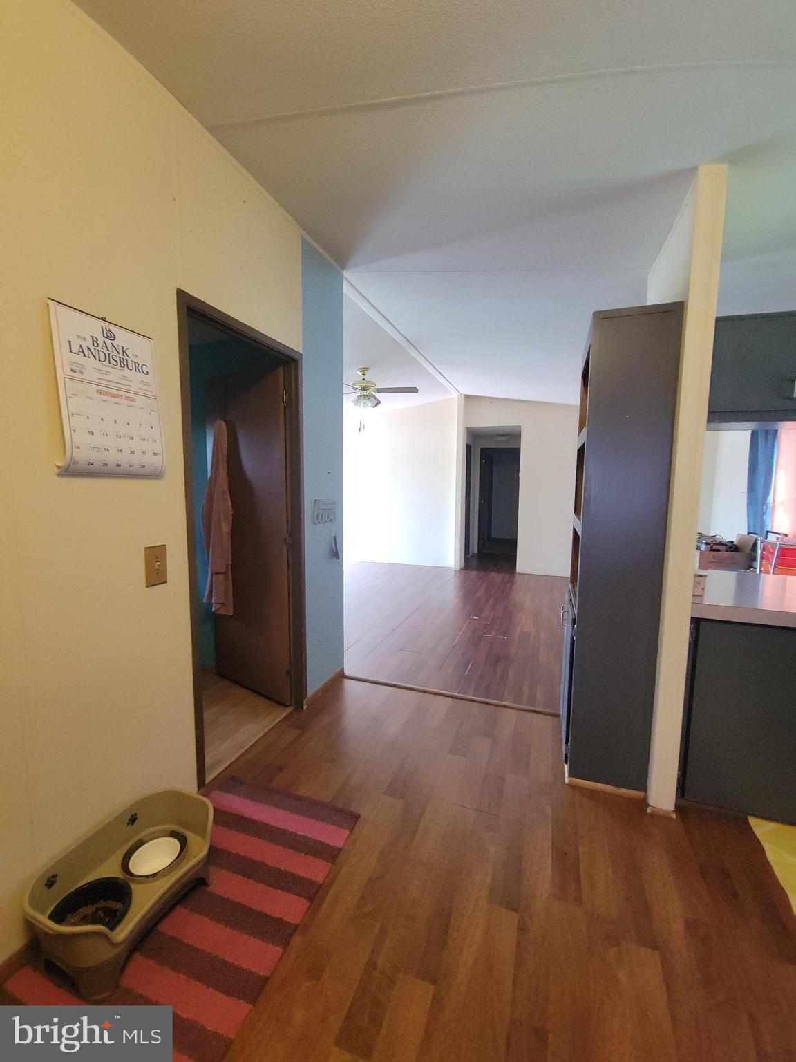 501 Windy Hill Road Shermans Dale, PA 17090 - Photo 12 of 33 a view of a hallway with wooden floor and furniture