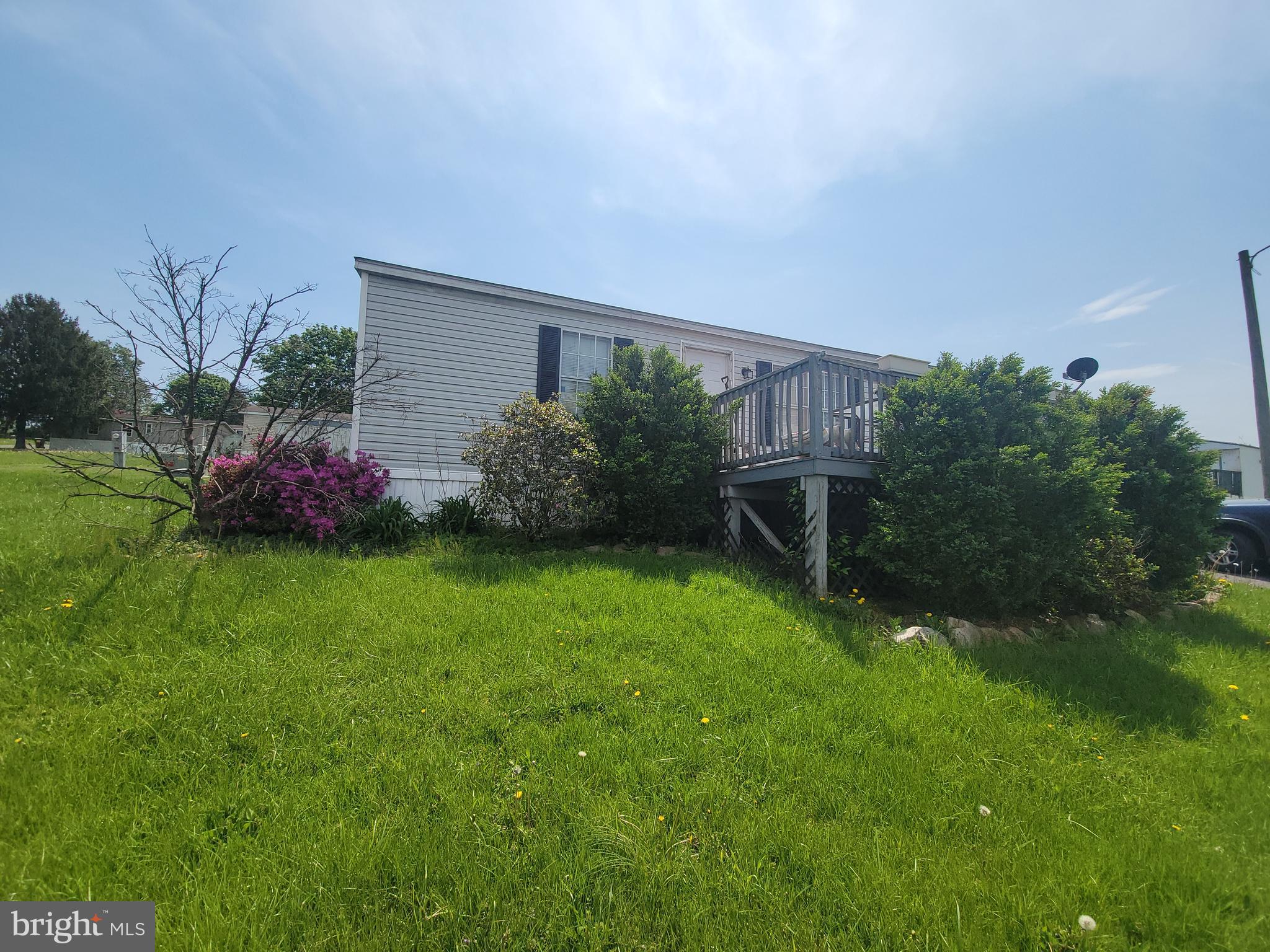 501 Windy Hill Road Shermans Dale, PA 17090 - Photo 2 of 33 a front view of a house with garden