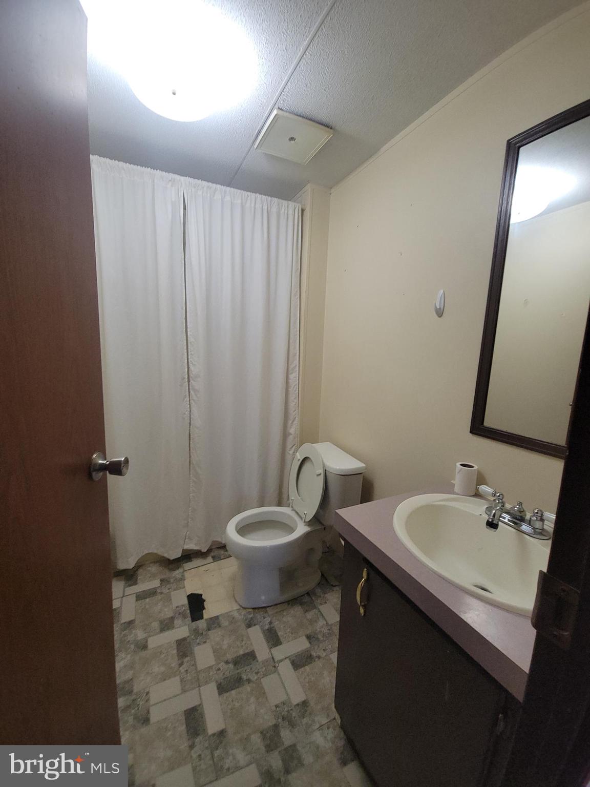 501 Windy Hill Road Shermans Dale, PA 17090 - Photo 29 of 33 a bathroom with a sink toilet and shower