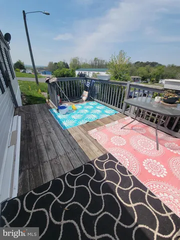 a view of an outdoor space with a balcony