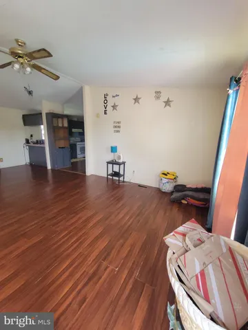 a view of livingroom with furniture and wooden floor