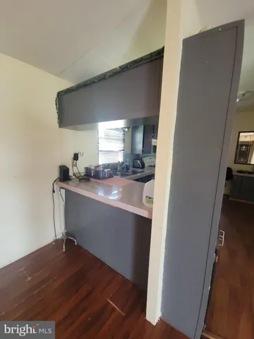 a room with a chair and a window