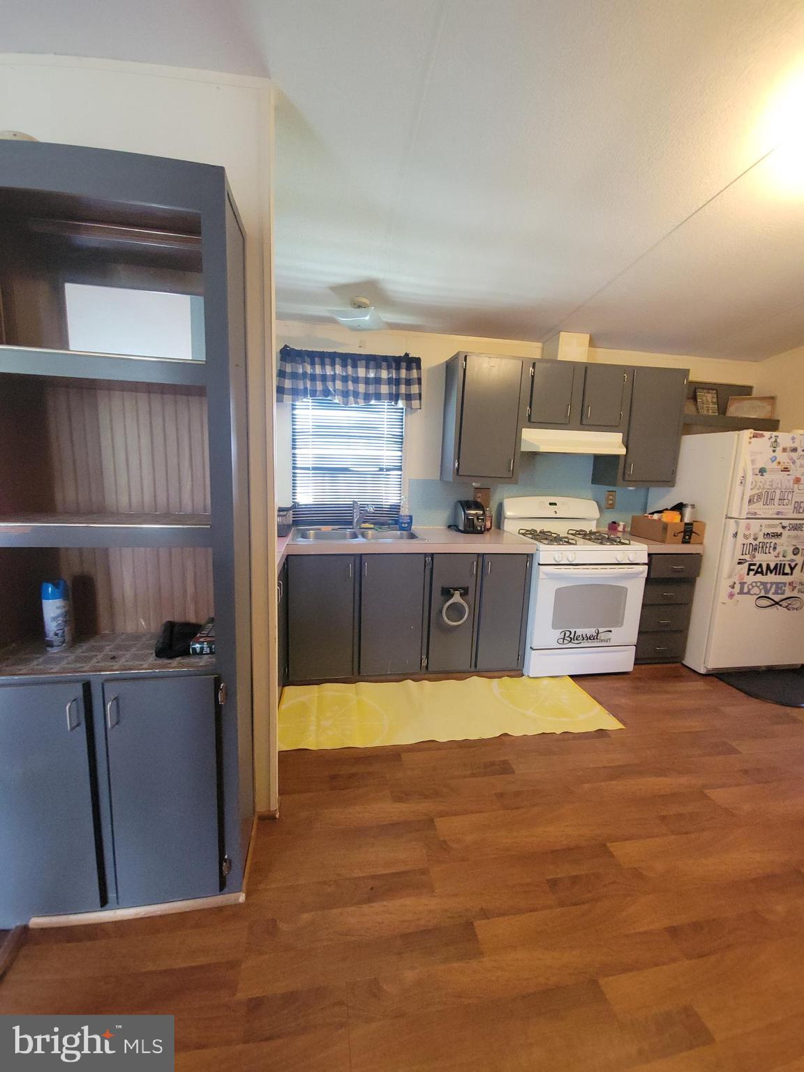 501 Windy Hill Road Shermans Dale, PA 17090 - Photo 9 of 33 a large kitchen with stainless steel appliances granite countertop a stove and a refrigerator