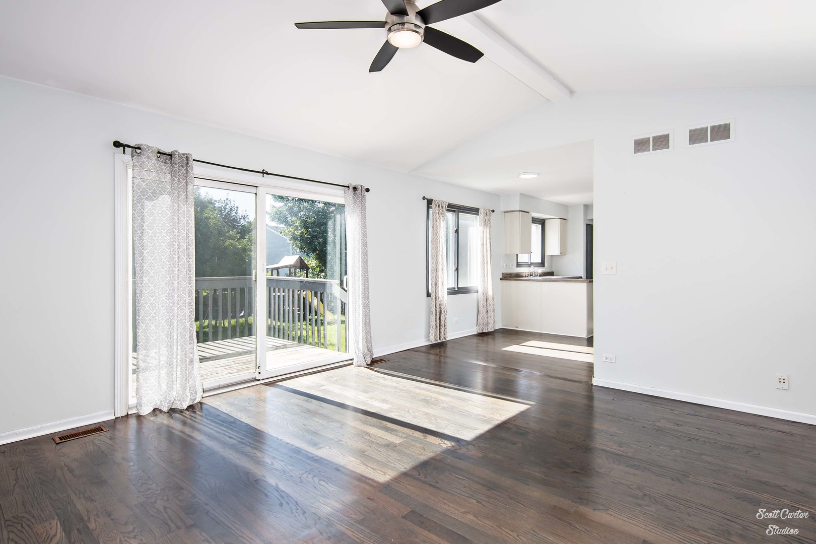225 Sierra Trail Cary, IL 60013 - Photo 16 of 23 a view of an empty room with wooden floor and a window