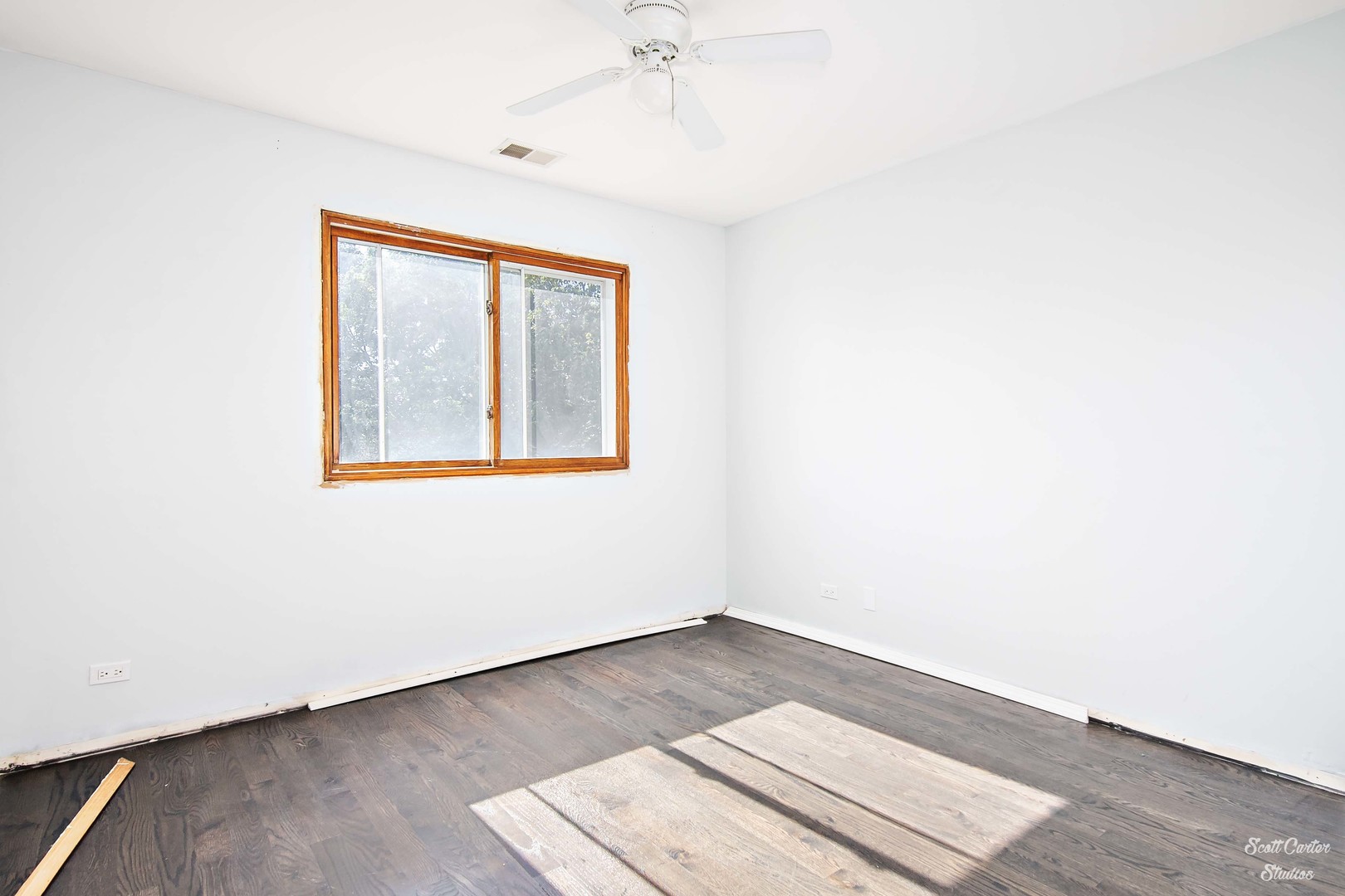 225 Sierra Trail Cary, IL 60013 - Photo 19 of 23 an empty room with wooden floor and windows