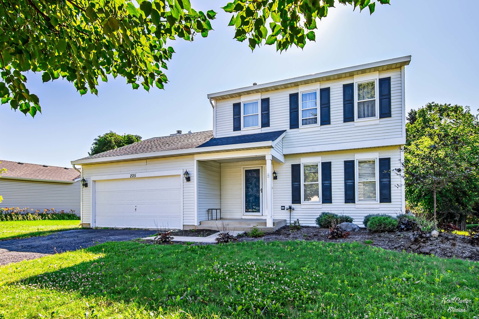 225 Sierra Trail Cary, IL 60013 - Photo 3 of 23 front view of a house with a yard