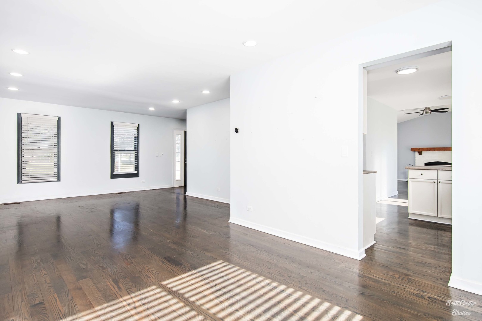 225 Sierra Trail Cary, IL 60013 - Photo 10 of 23 a view of an empty room with window and wooden floor
