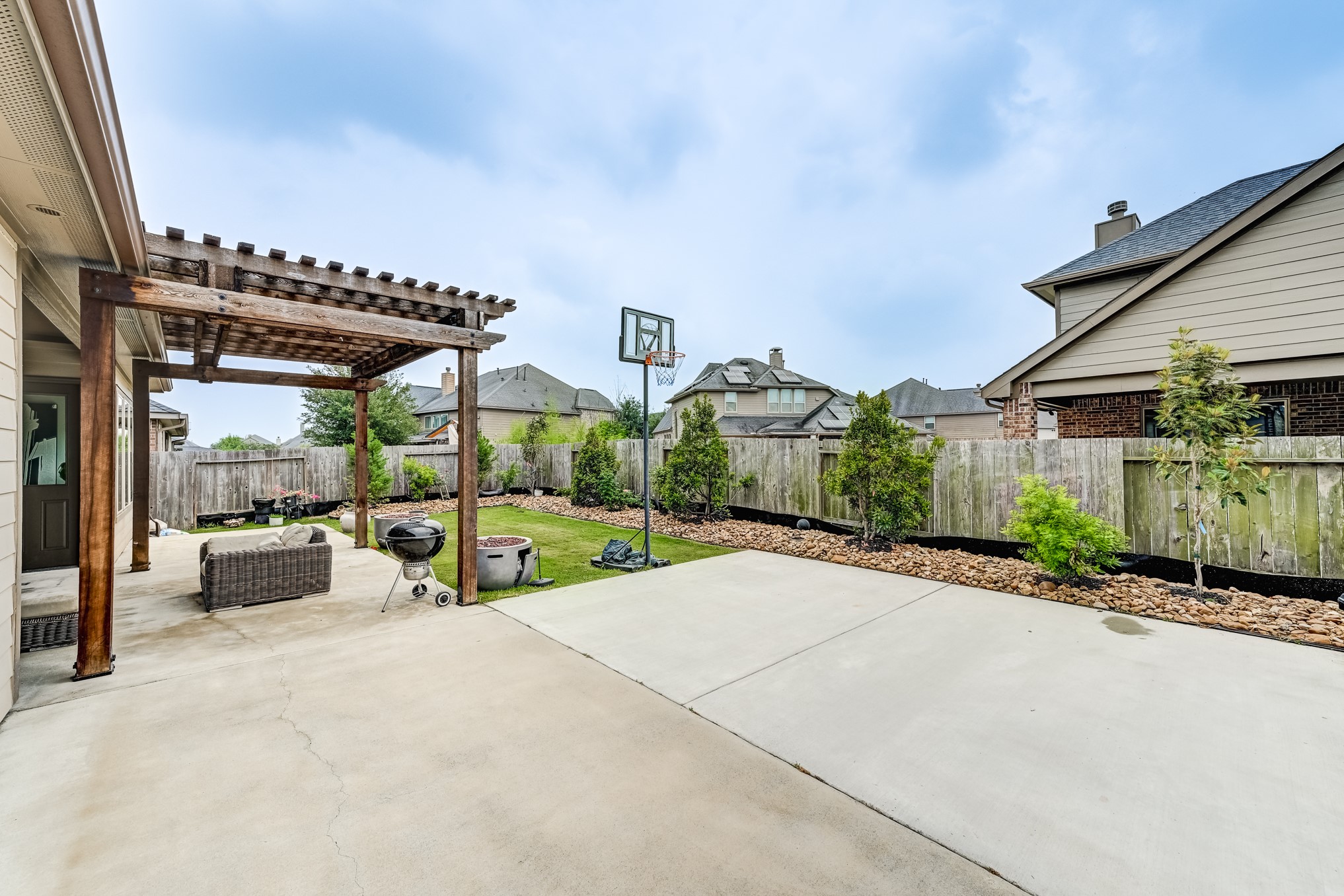 5806 Metaphor Way Rosenberg, TX 77469 - Photo 43 of 50 a view of a house with a patio