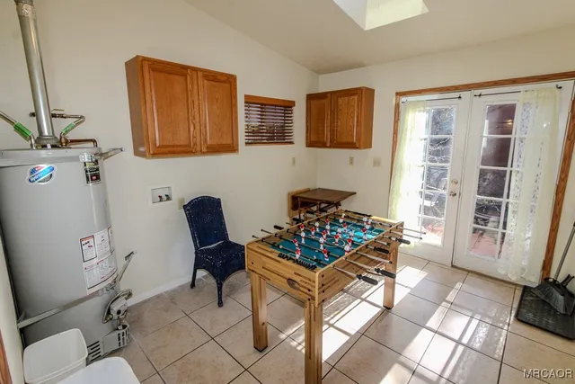 a living room with furniture and a gate