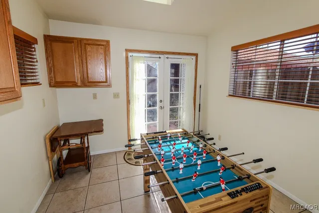 a room with toys and wooden floor
