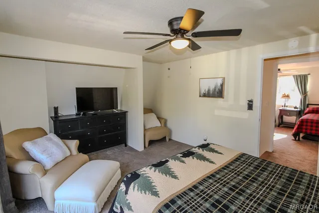 a bedroom with a bed and furniture