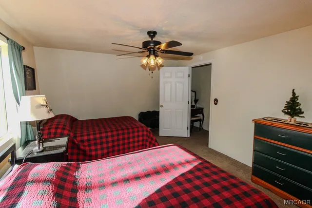 a bedroom with a bed and a walk in closet