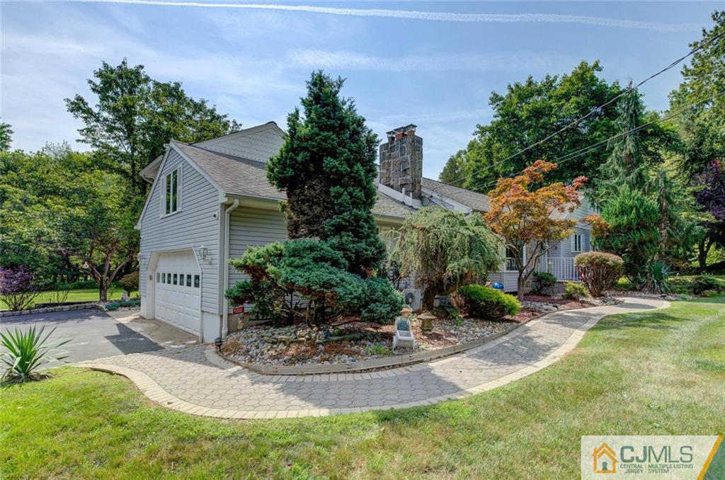 304 Fresh Ponds Road North Brunswick, NJ 08902 - Photo 3 of 44 a view of a house with backyard and sitting area