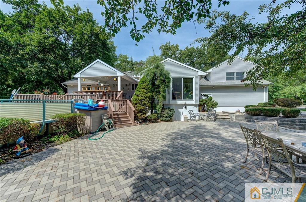 304 Fresh Ponds Road North Brunswick, NJ 08902 - Photo 35 of 44 a front view of a house with garden