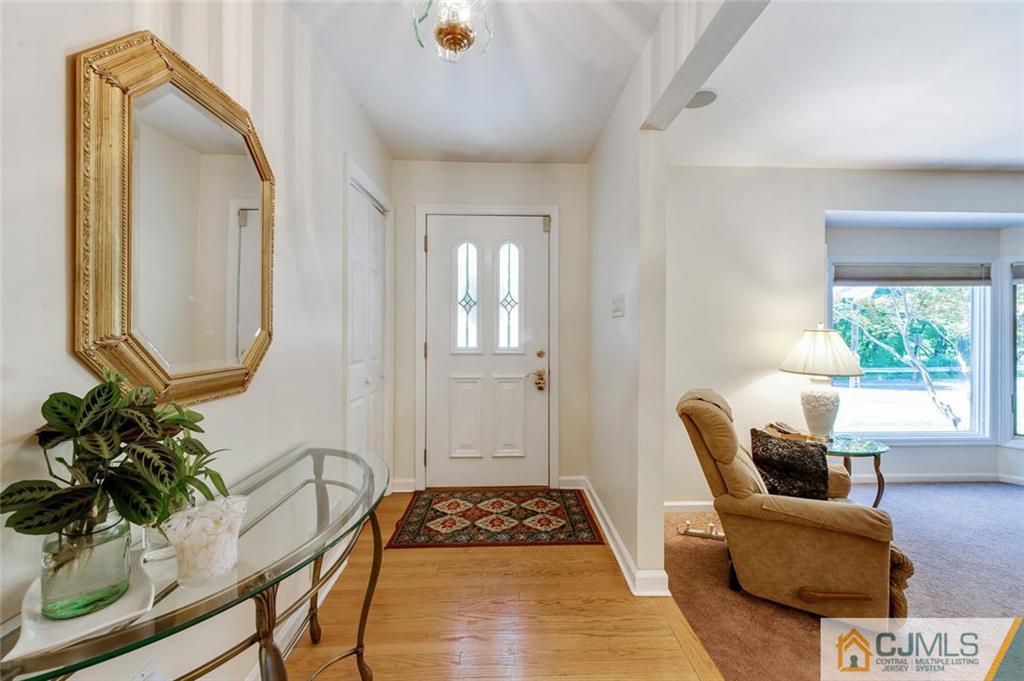 304 Fresh Ponds Road North Brunswick, NJ 08902 - Photo 6 of 44 a bedroom with furniture and a window