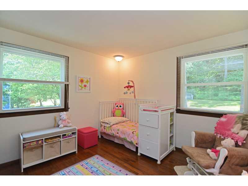 1736 Fox Chapel Road Pittsburgh, PA 15238 - Photo 18 of 25 Bedroom. Fifth bedroom with hardwood flooring and neutral dcor.
