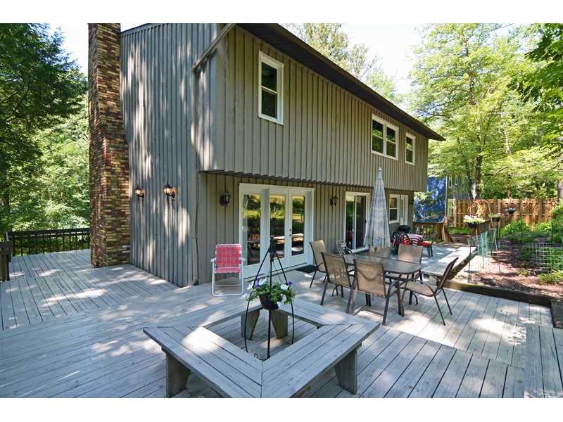 1736 Fox Chapel Road Pittsburgh, PA 15238 - Photo 20 of 25 Patio/Deck. The expansive wraparound deck is ideal for summer parties and opens to the large back yard.