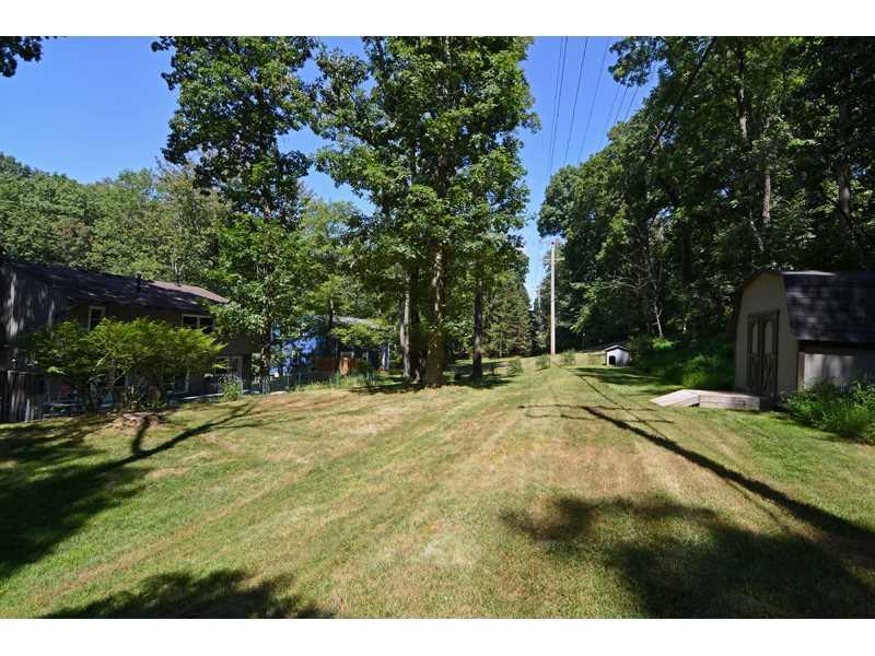 1736 Fox Chapel Road Pittsburgh, PA 15238 - Photo 23 of 25 Exterior Back. The generously sized back yard is ideal for children and pets.