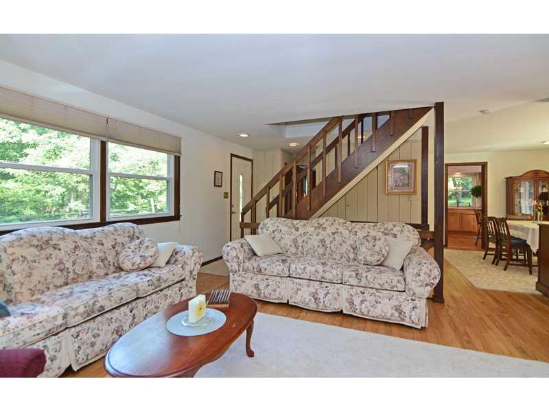 1736 Fox Chapel Road Pittsburgh, PA 15238 - Photo 5 of 25 Living Room. The living room unfolds into the neighboring dining room.