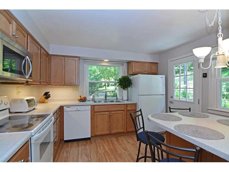 1736 Fox Chapel Road Pittsburgh, PA 15238 - Photo 9 of 25 Kitchen. The updated eat-in kitchen boasts a built-in breakfast bar and gorgeous hardwood cabinetry.