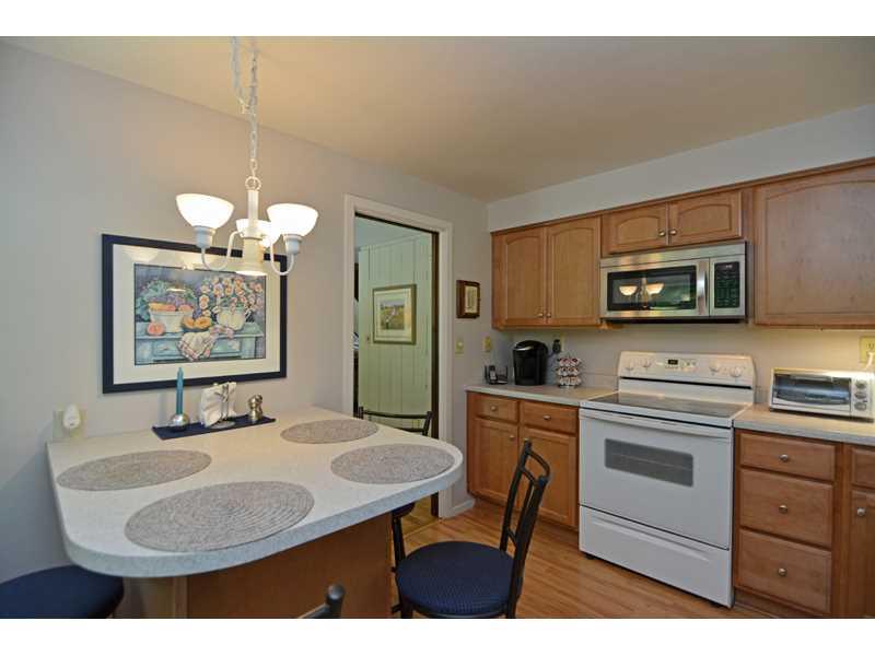 1736 Fox Chapel Road Pittsburgh, PA 15238 - Photo 10 of 25 Kitchen. Reverse-angle view of the kitchen shows the built-in table and high quality appliances.