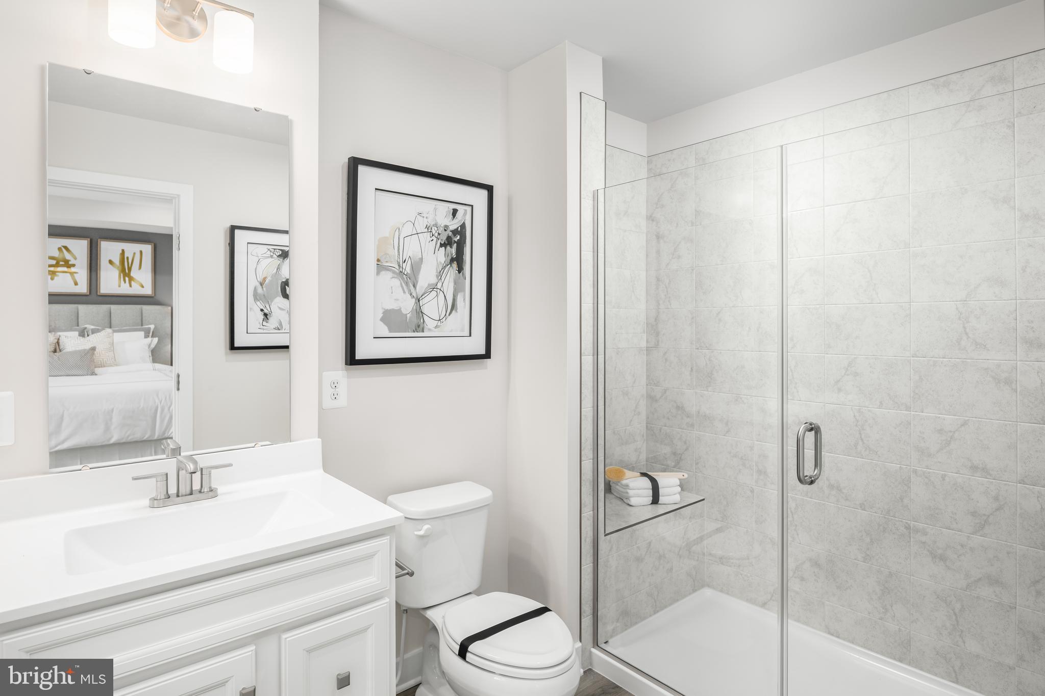 8428 Branch Side Way, Unit D Brandywine, MD 20613 - Photo 17 of 23 a bathroom with a sink toilet and shower