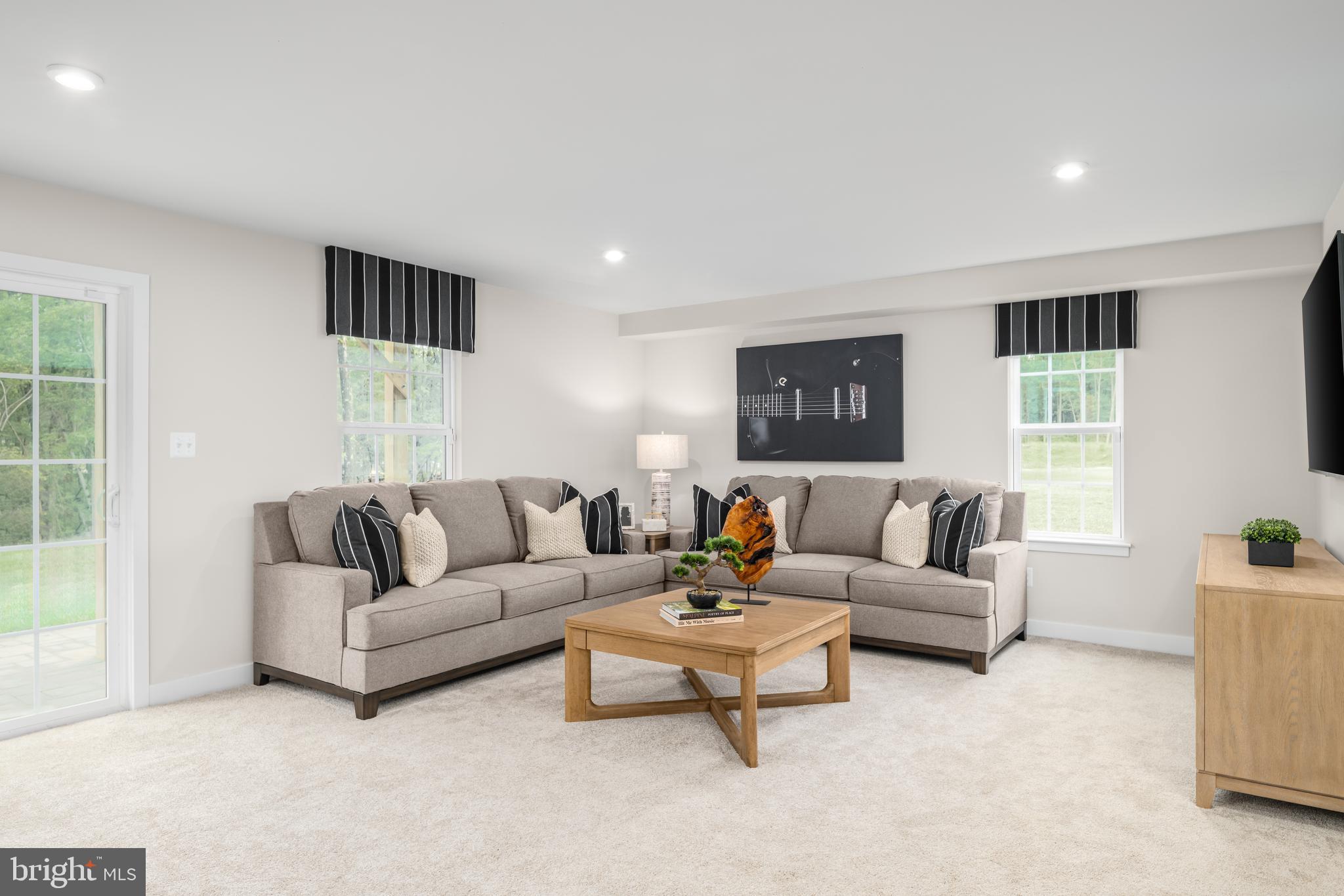 8428 Branch Side Way, Unit D Brandywine, MD 20613 - Photo 3 of 23 a living room with furniture and windows