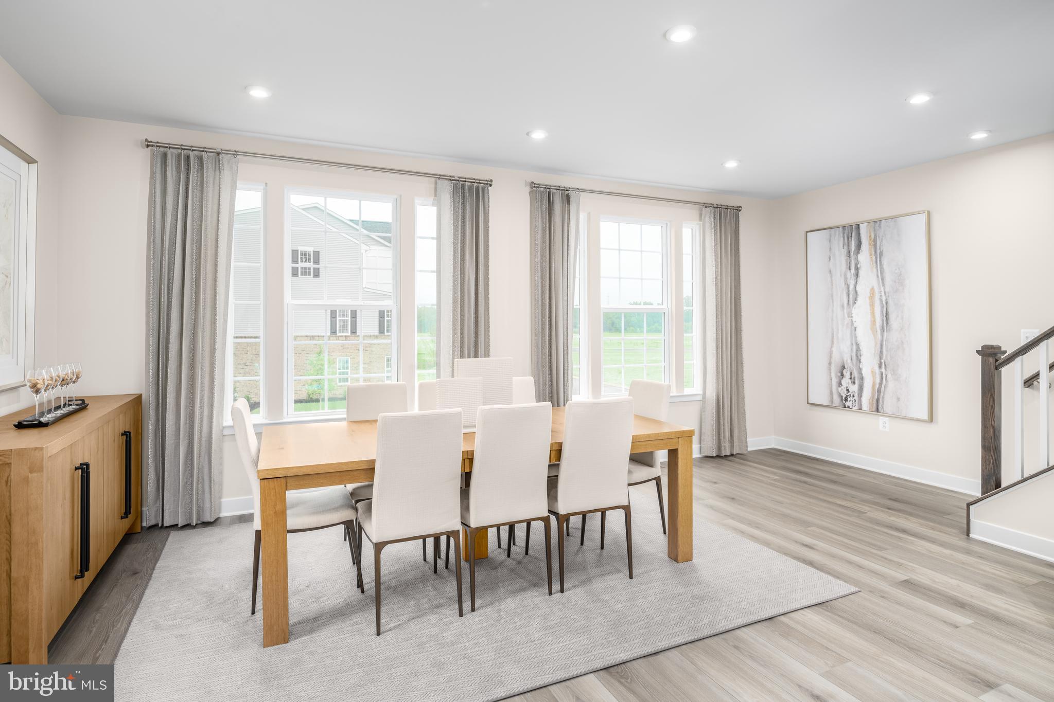 8428 Branch Side Way, Unit D Brandywine, MD 20613 - Photo 10 of 23 a view of a a dining room with furniture window and outside view