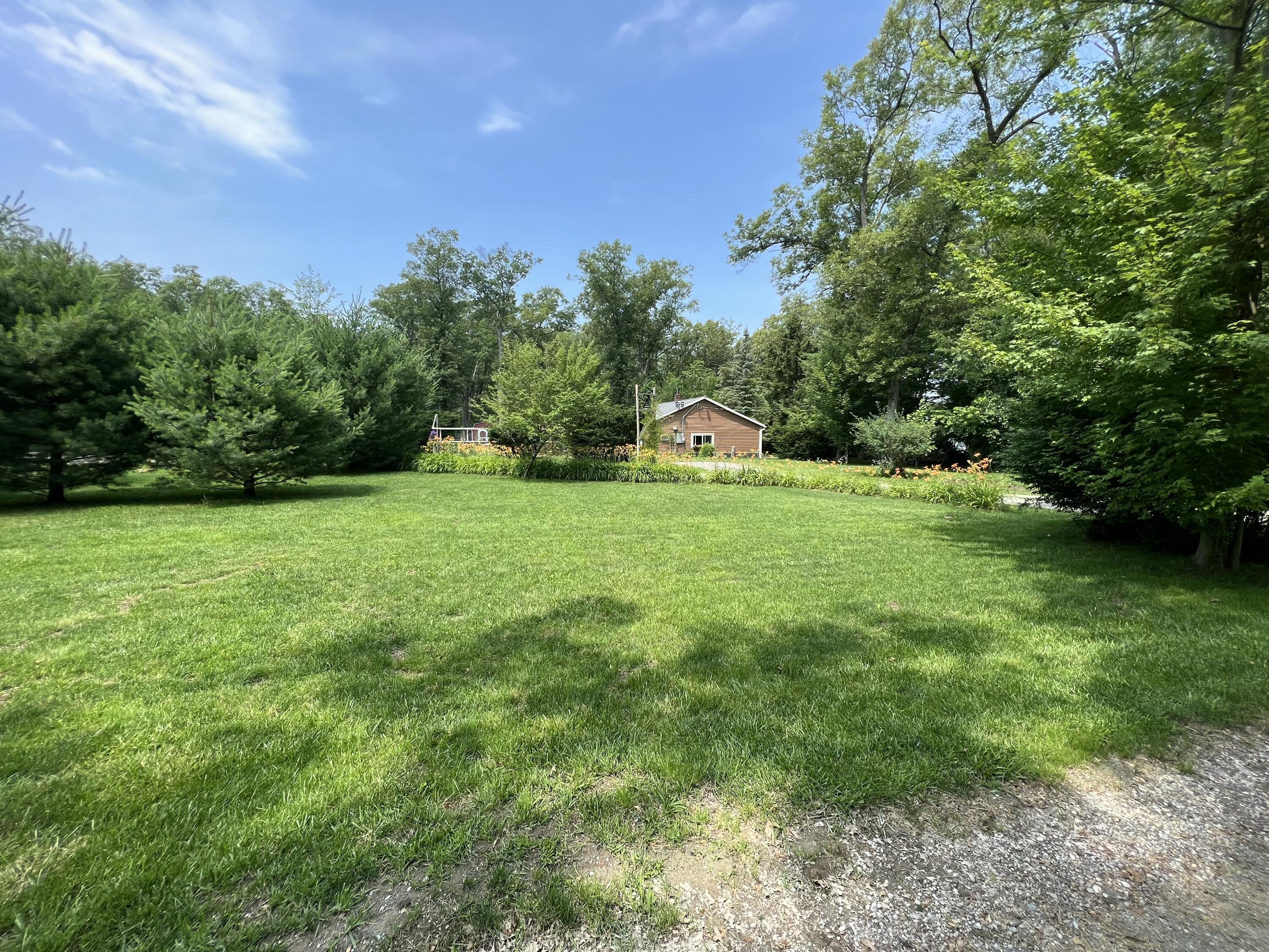 125 West Ashland Road Twin Lake, MI 49457 - Photo 3 of 61 IMG_20260127_170207