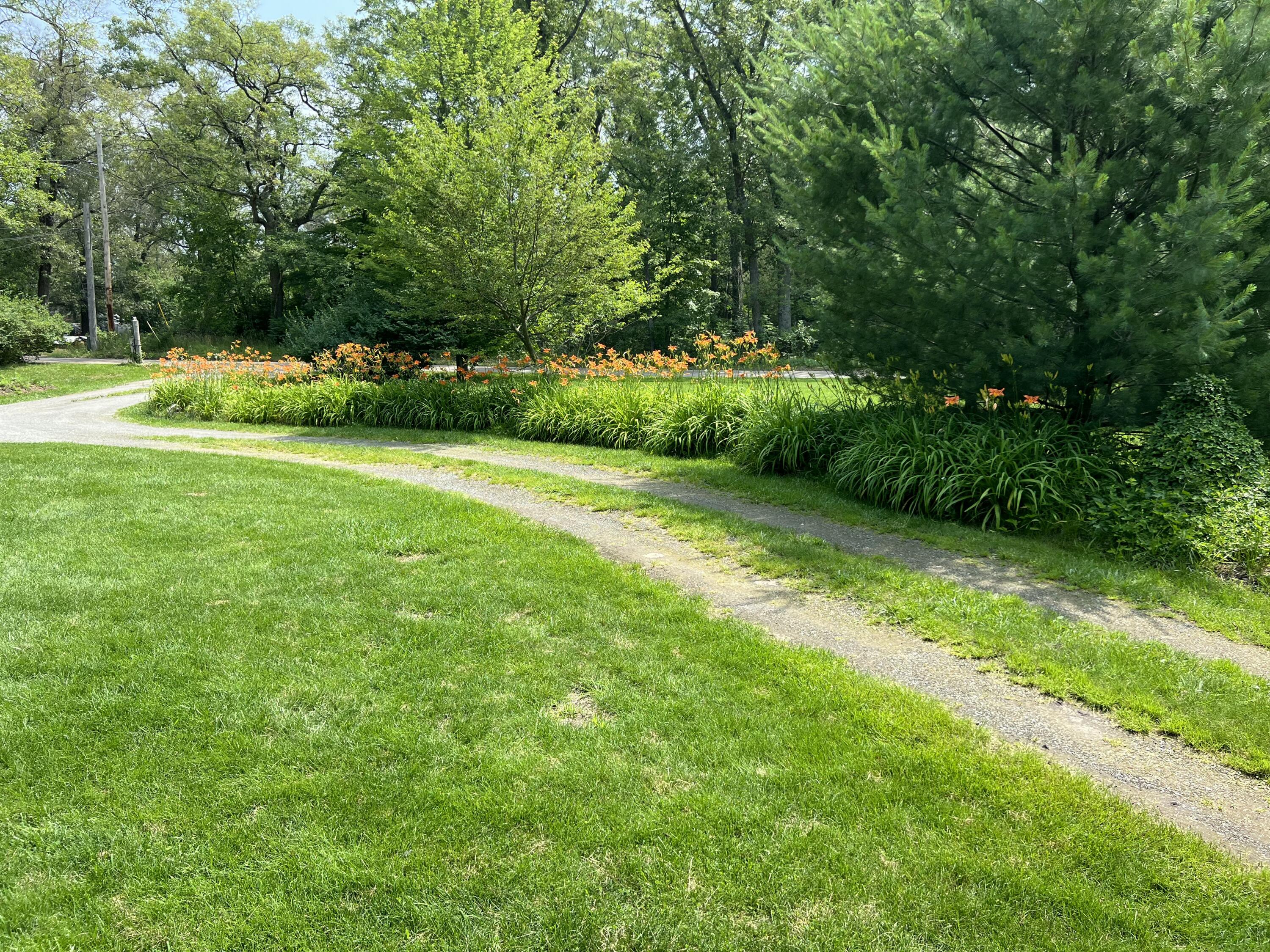 125 West Ashland Road Twin Lake, MI 49457 - Photo 4 of 61 IMG_20260127_170205