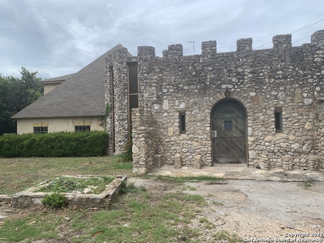 6617 Countess Adria Street Leon Valley, TX 78238 - Photo 15 of 20 a front view of a house with a yard