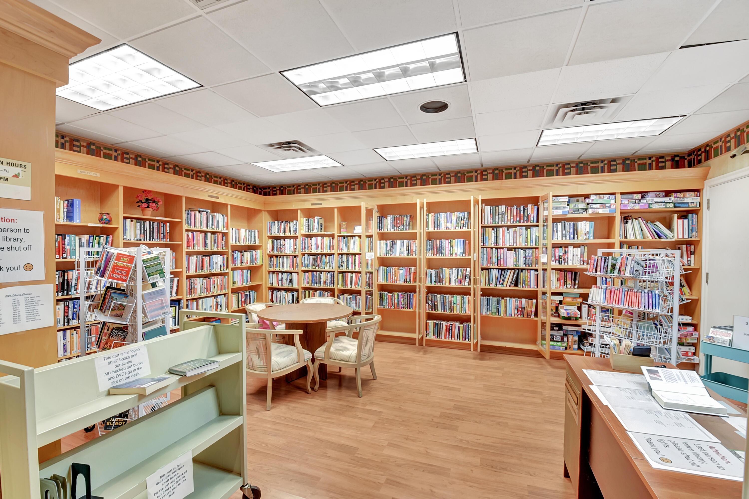 2601 Northwest 15th Street Delray Beach, FL 33445 - Photo 48 of 59 a reading room with furniture and book shelf