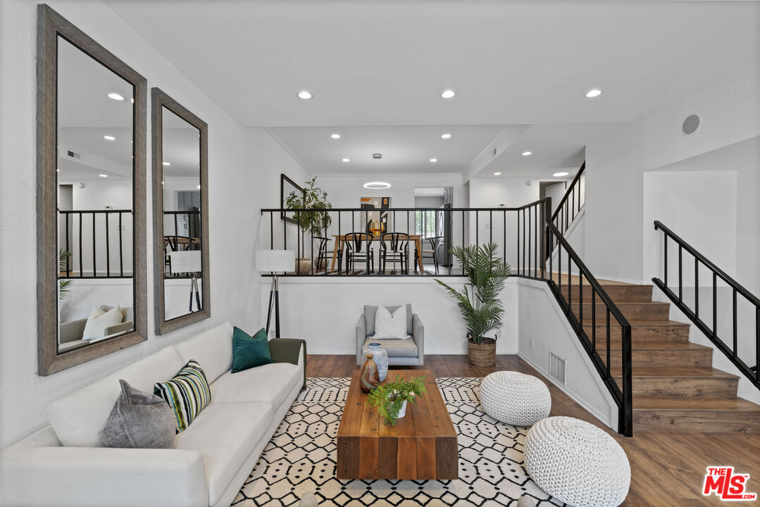 4549 Alla Road, Unit 3 Marina del Rey, CA 90292 - Photo 1 of 28 a living room with furniture and wooden floor