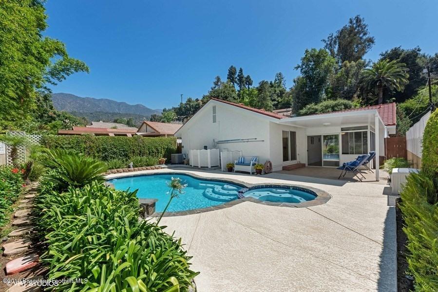 421 Cloverleaf Drive Monrovia, CA 91016 - Photo 19 of 21 a view of a white house with a yard
