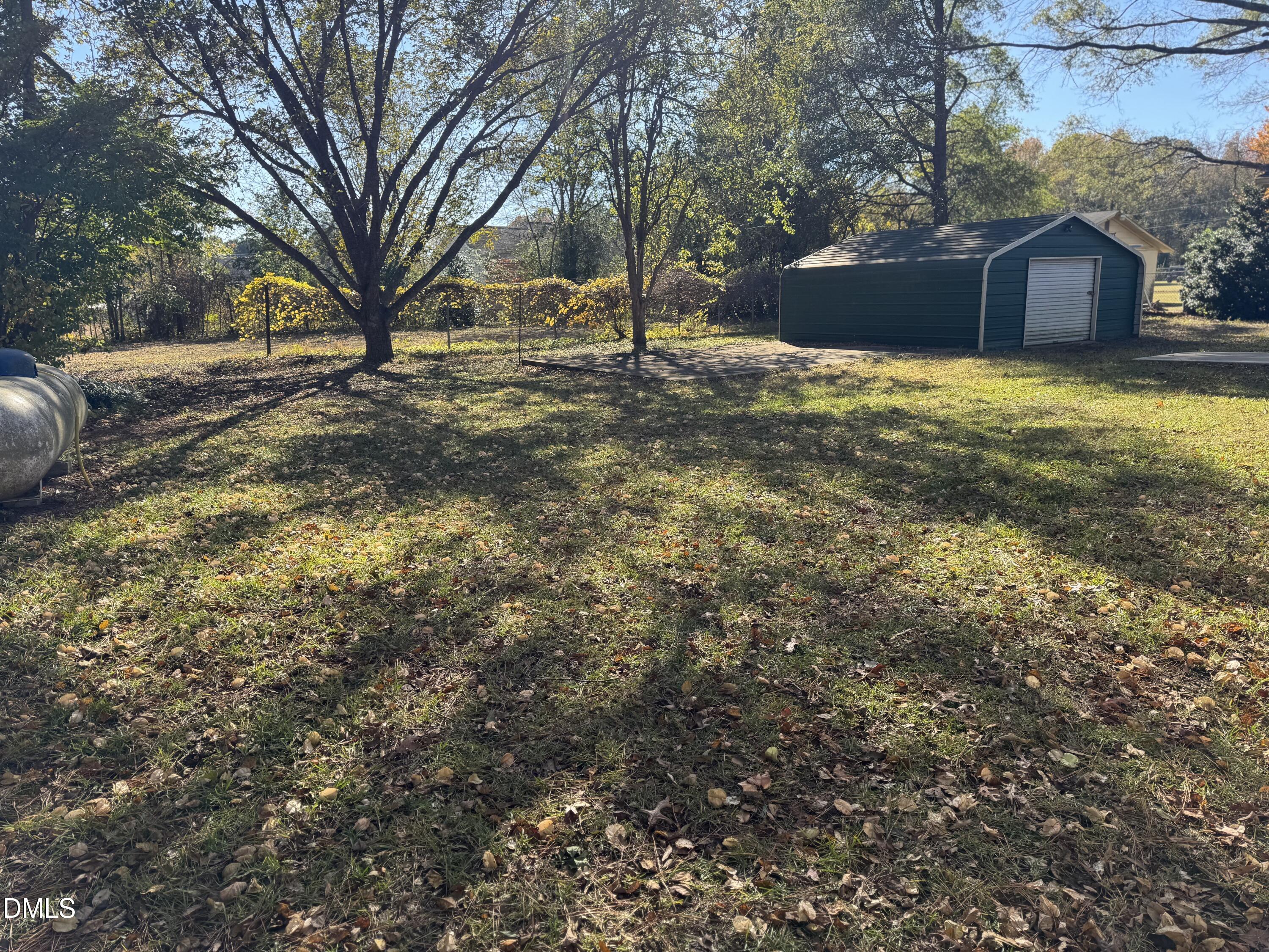 11993 Rockside Road Middlesex, NC 27557 - Photo 13 of 15 a view of a yard with a house and a large tree