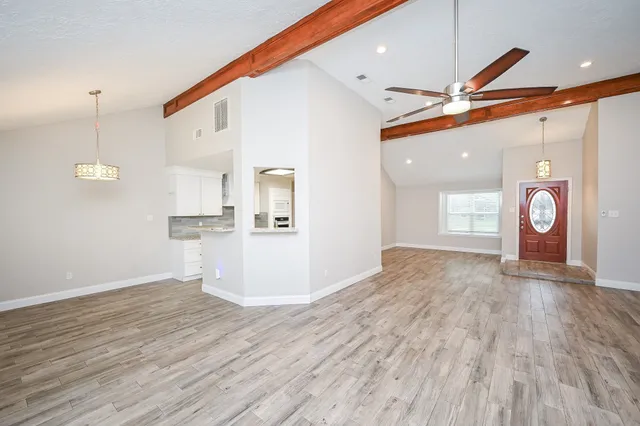a view of a kitchen with marble kitchen and sink
