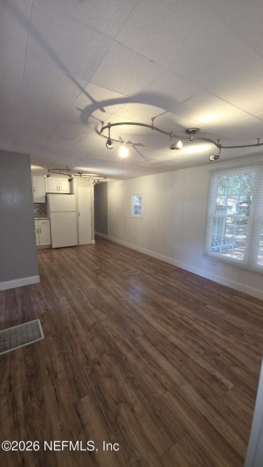 2781 Schaller Road St. Augustine, FL 32084 - Photo 7 of 9 a view of empty room with wooden floor