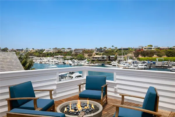 a view of a chairs and table in a terrace