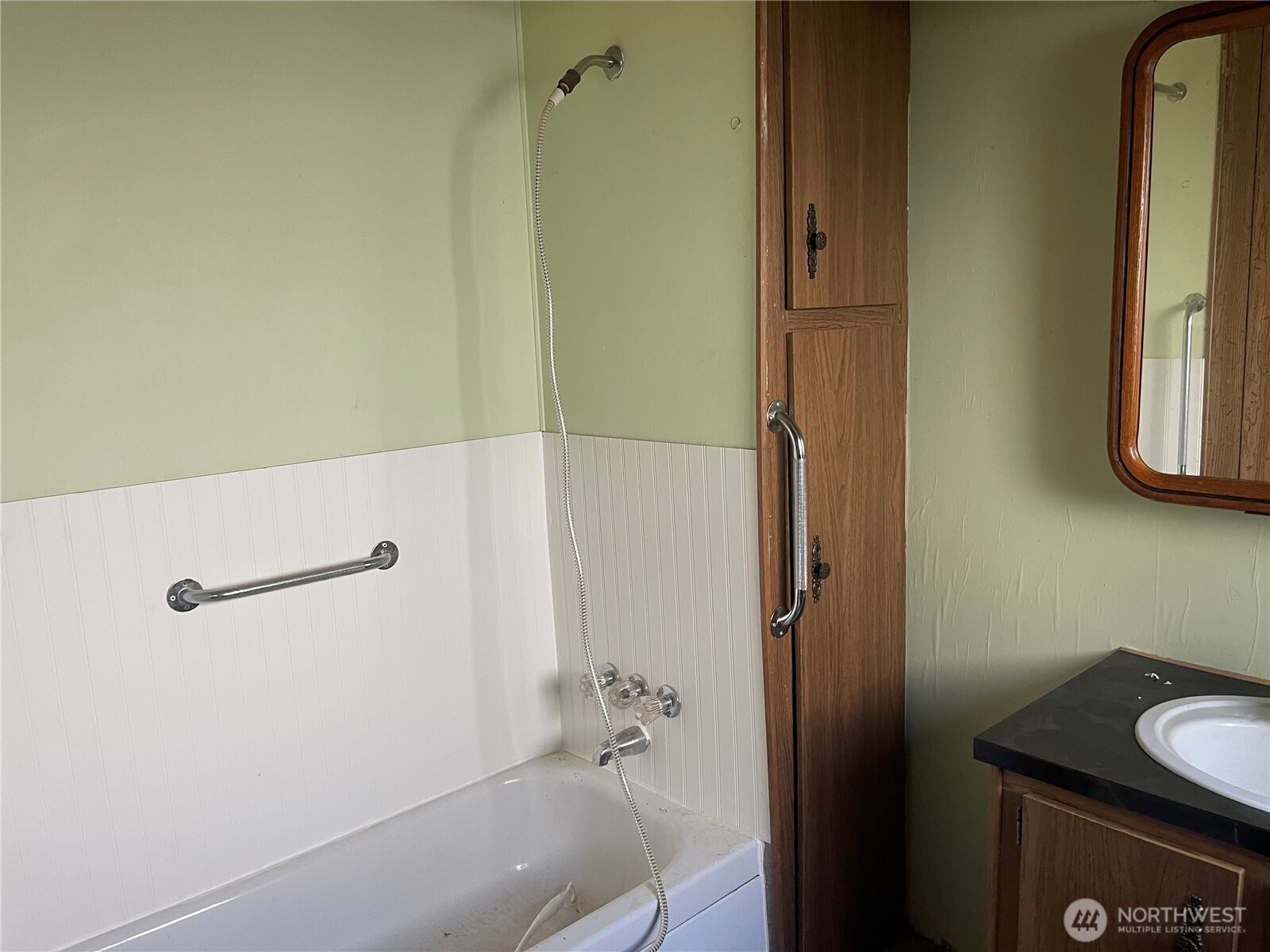 3333 228th Street Southeast, Unit 94 Bothell, WA 98021 - Photo 11 of 12 a bathroom with a bathtub and a shower