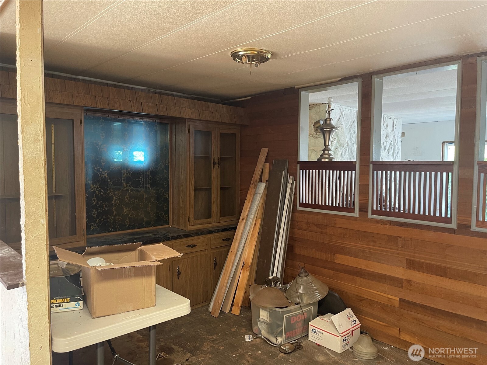 3333 228th Street Southeast, Unit 94 Bothell, WA 98021 - Photo 4 of 12 a view of a porch with furniture and wooden floor