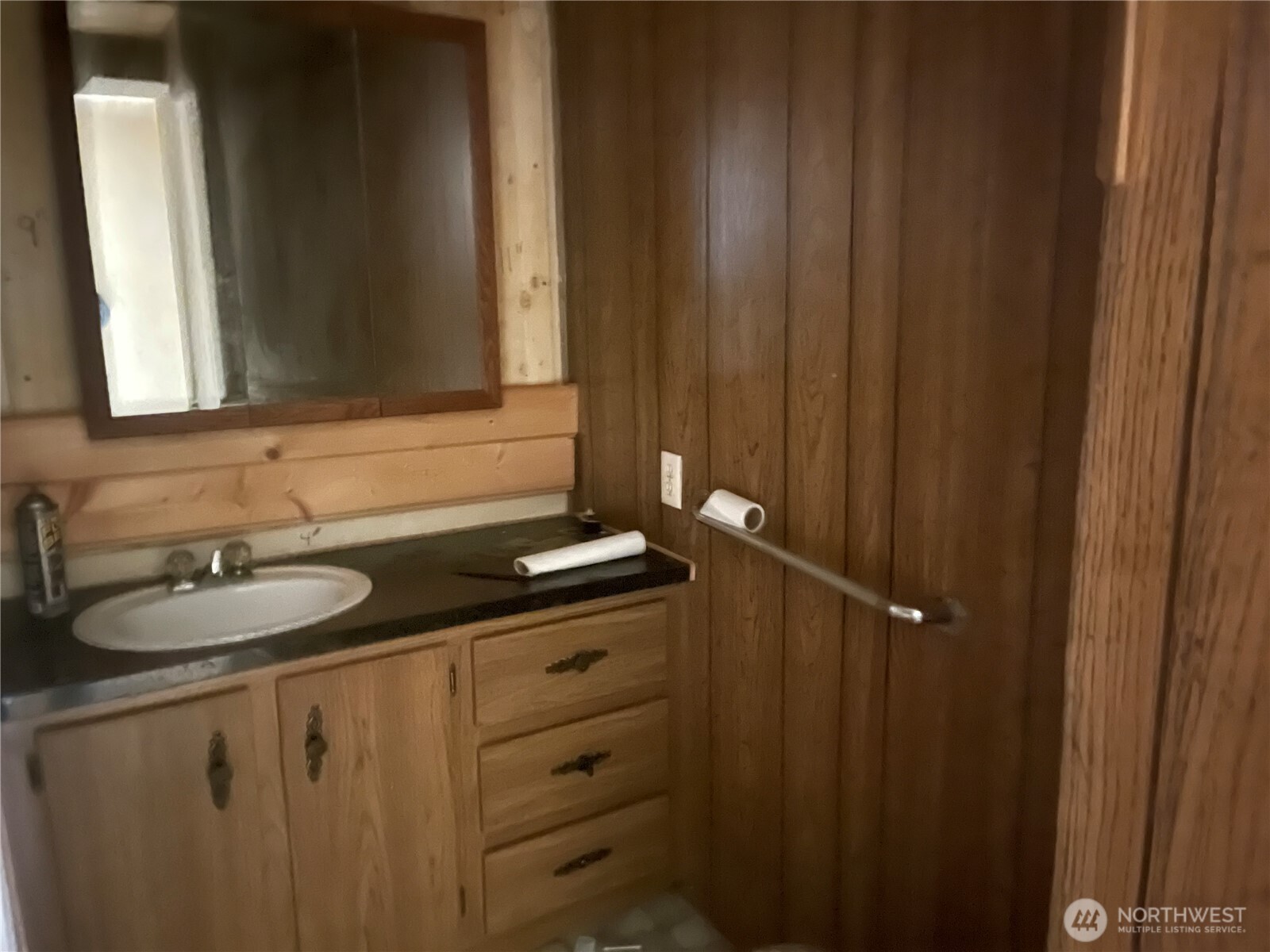3333 228th Street Southeast, Unit 94 Bothell, WA 98021 - Photo 9 of 12 a bathroom with a sink and a mirror