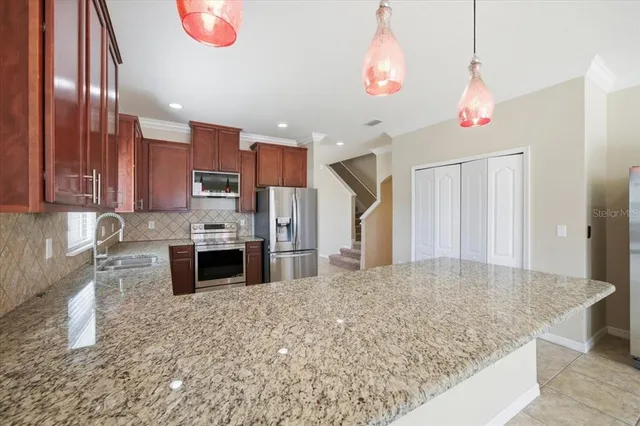 $450,000 | 13366 Barkingside Place, Spring Hill, FL 34609