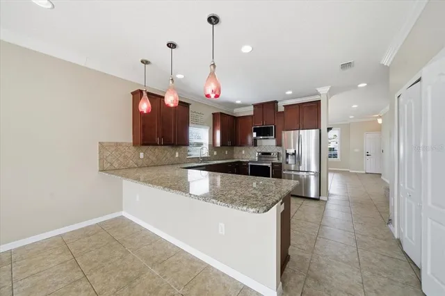 $450,000 | 13366 Barkingside Place, Spring Hill, FL 34609