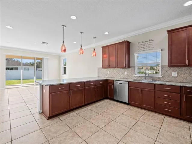 $450,000 | 13366 Barkingside Place, Spring Hill, FL 34609