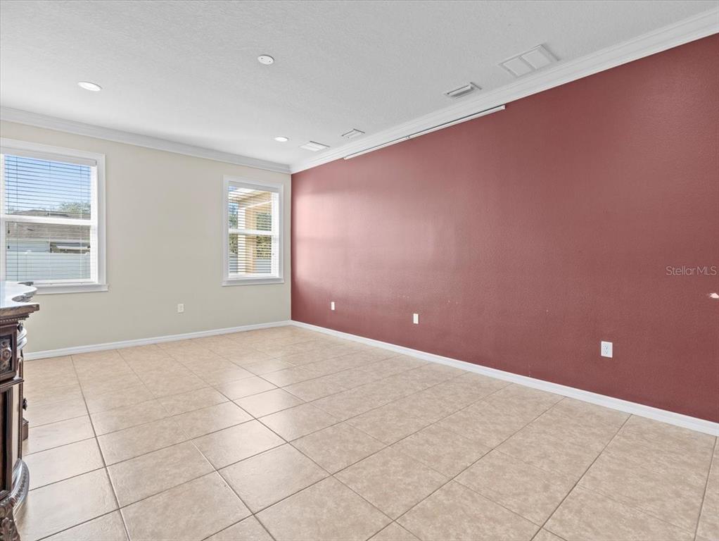 13366 Barkingside Place Spring Hill, FL 34609 - Photo 23 of 41 a view of an empty room with a window