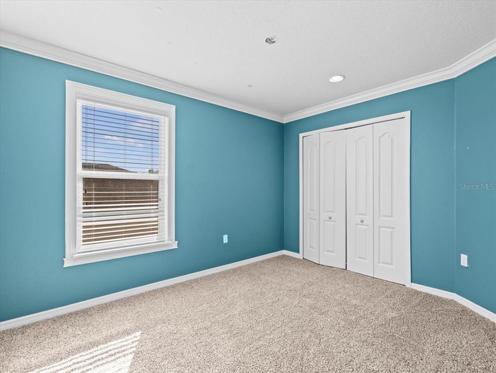 13366 Barkingside Place Spring Hill, FL 34609 - Photo 35 of 41 a view of an empty room with a window