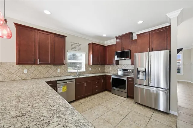 $450,000 | 13366 Barkingside Place, Spring Hill, FL 34609