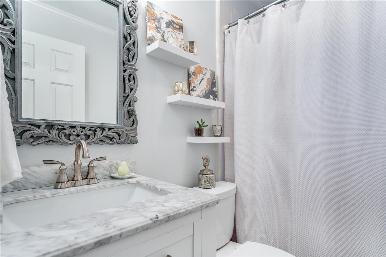 2715 Rothgeb Drive Raleigh, NC 27609 - Photo 17 of 25 FRESHLY UPDATED FULL BATHROOM COMPLETE WITH NEW MIRROR, VANITY, AND PAINT. Bathroom